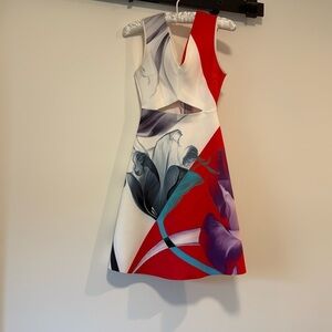 Clover Canyon 
Size XS
Used 
Front cutout, flower image